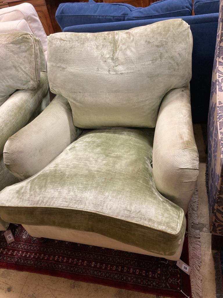 A George Smith Howard style armchair upholstered in pale green velvet, width 80cm, depth 110cm, height 82cm